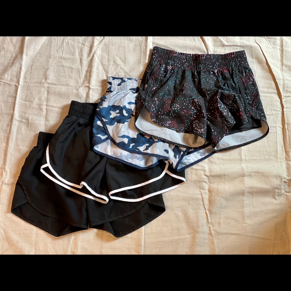 FOUR pairs of women’s size XS athletic shorts